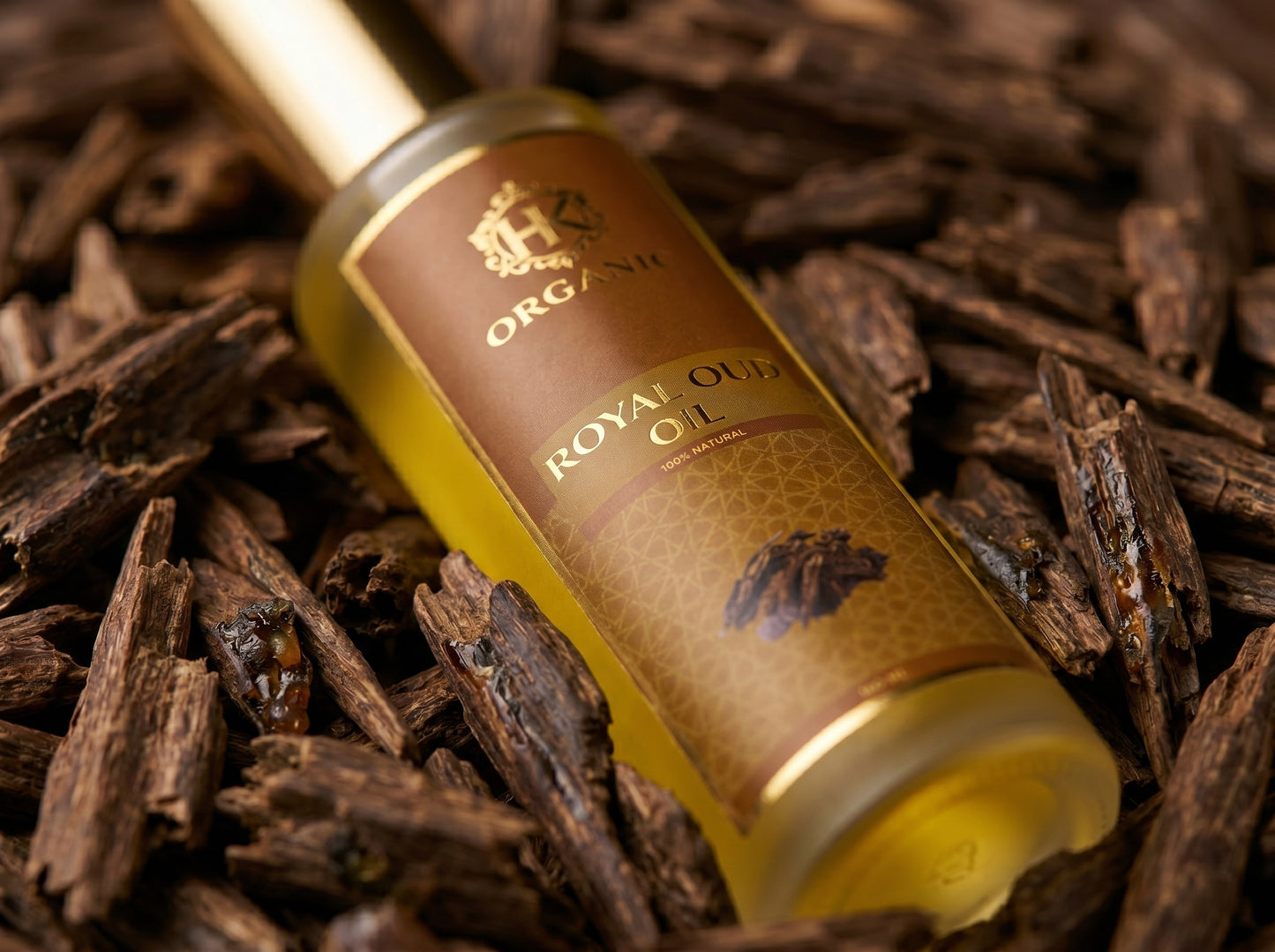 Bottle of Royal Oils on a background of dried roots
