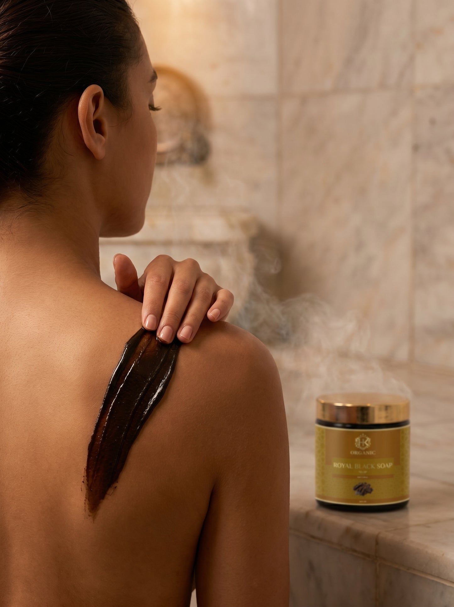 Person with a jar of blackhead removal product in a bathroom setting