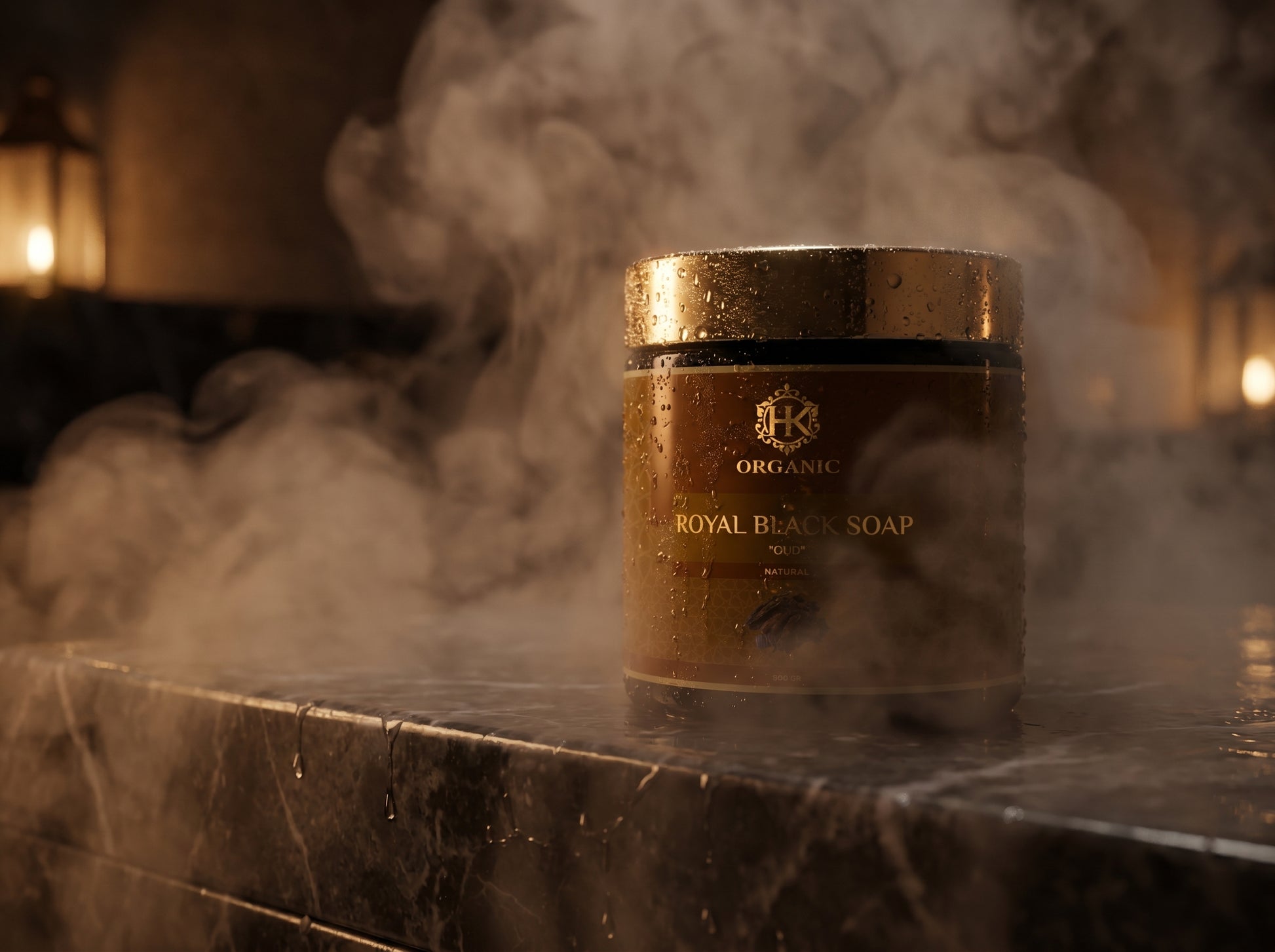 Royal Black Soap container on a marble surface with steam in the background